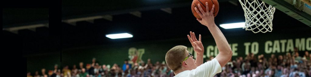 Basketball Player Shooting Ball